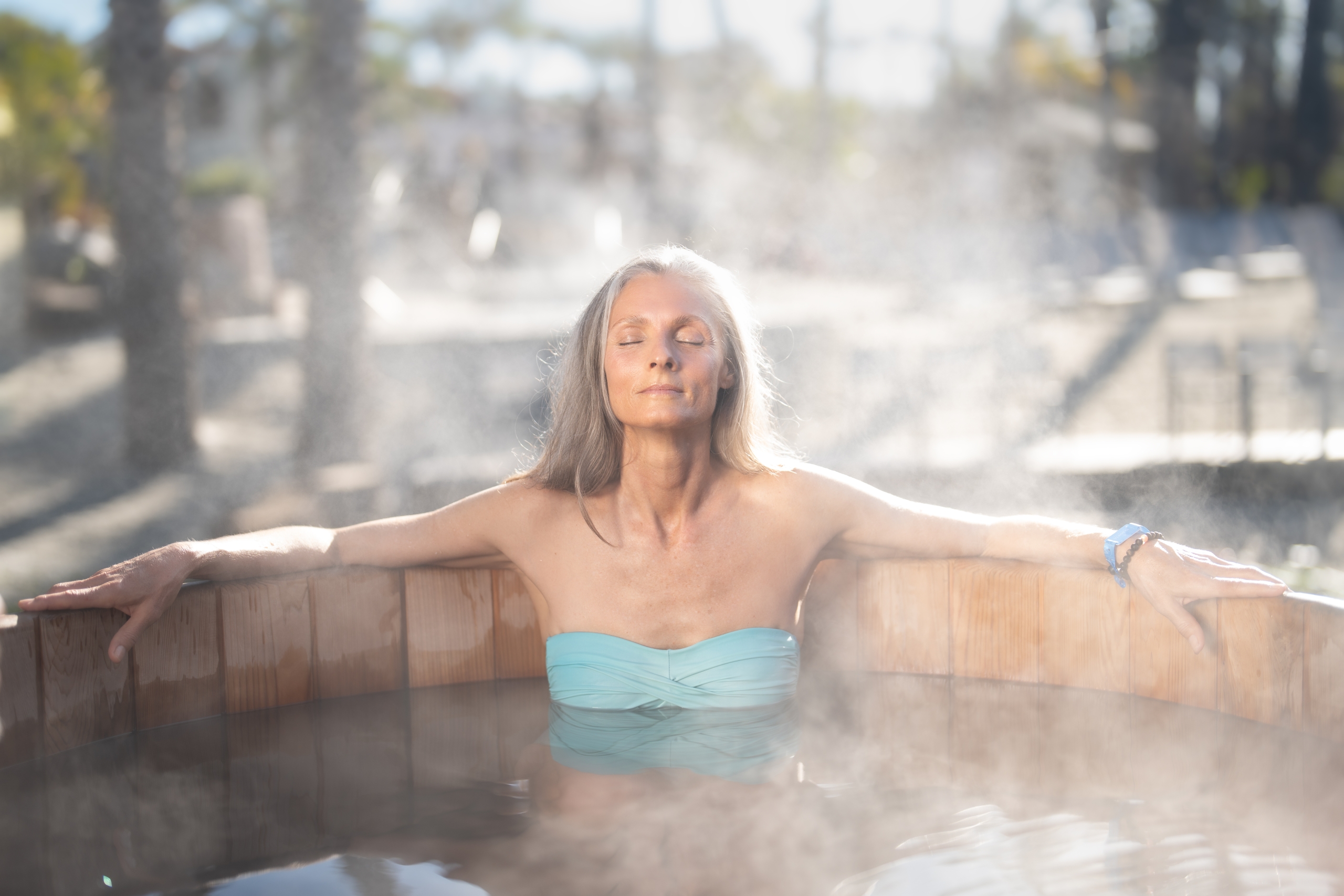 Woman relaxing in hot tub