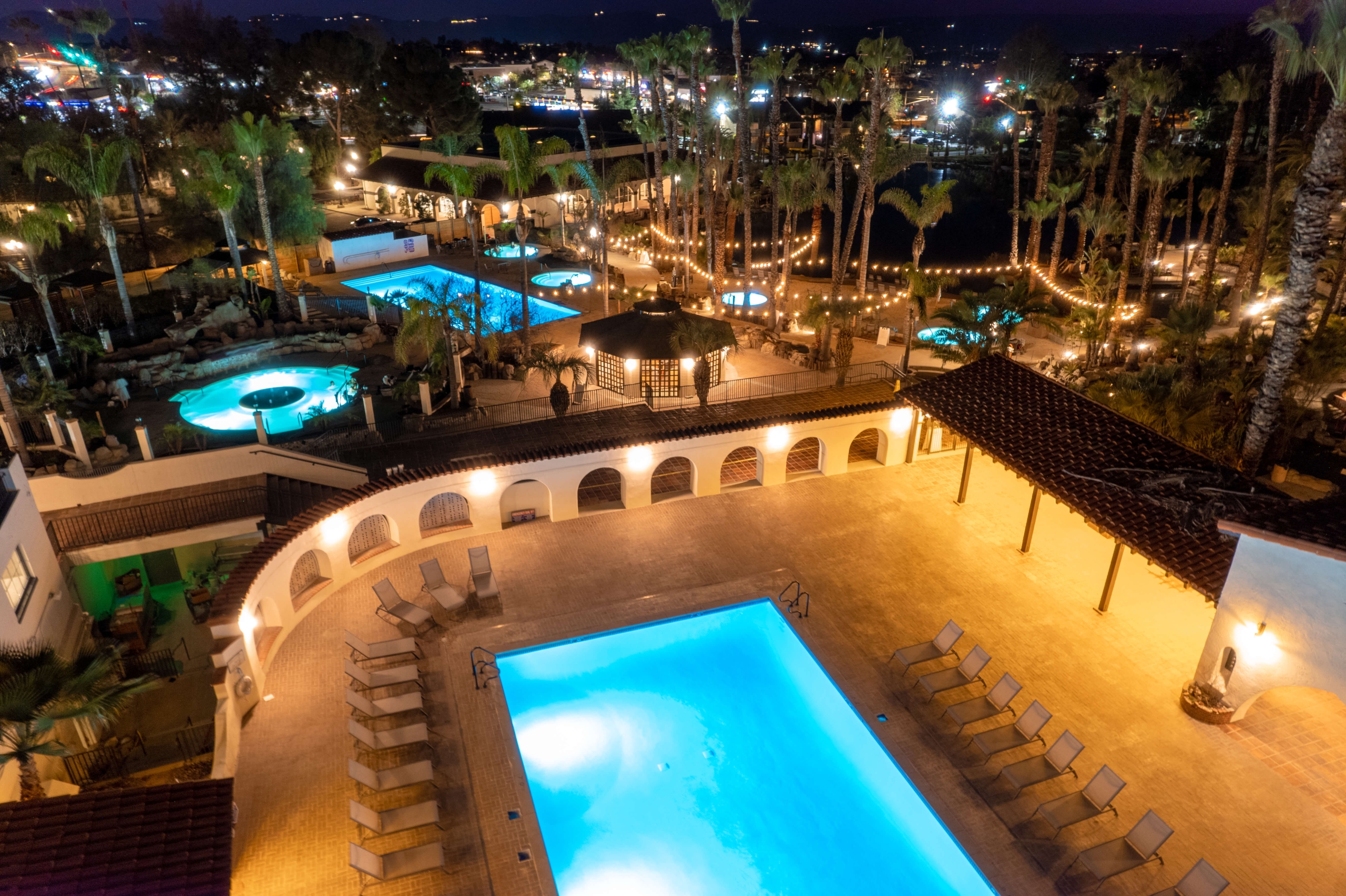 Drone Shot or Multiple Geothermal Mineral Pool at Murrieta Hot Springs at Night